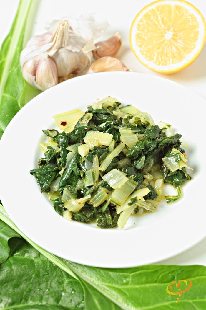 Swiss chard "Fordhook" Giant seeds by SeedsNow, fresh green leaves and vibrant stems in a garden setting.